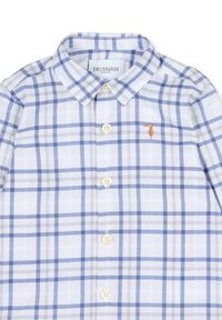 Geruit overhemd in blauw, grijs en wit. Beschikt over een button-down kraag, zes knopen en een geborduurd logo in goud. Katoenen stof.