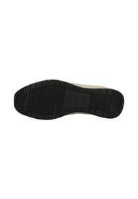 Suola della scarpa in gomma nera con motivi di battistrada testurizzati, caratterizzata da una parte superiore beige liscia e un design della punta arrotondata.