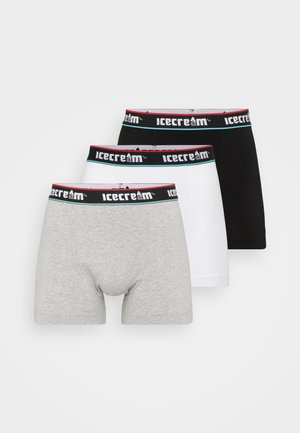 Három pár boxer alsó: szürke, fehér és fekete. Puha anyag, rugalmas derékpánttal, piros és kék "fagyi" logóval.