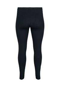 Mustad retuusid, mis on valmistatud venivast kangast, millel on elastne vöökoht ja jalgeosas kitseneva lõikega stiil. Sile pind.