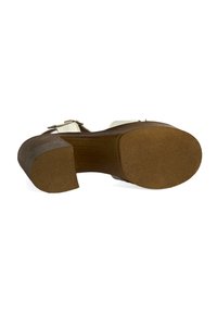 Talons en bois marron avec une base de grip texturée, présentant une bride supérieure blanche. Le design est ouvert à l'avant, mettant en avant un style simple et fonctionnel.