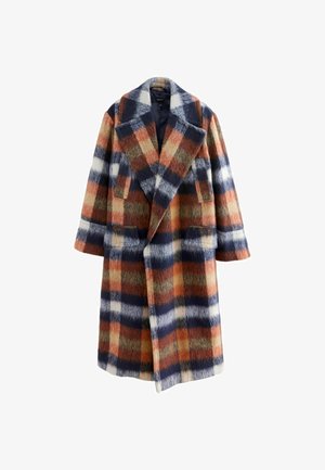 Vilnas maisījuma garais mētelis ar zilu, oranžu un baltu rūtainu rakstu, plašiem atlokiem un divām priekšējām kabatām. Maiga, fakturēta auduma.