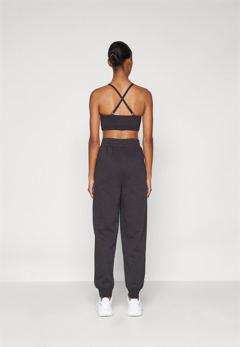 Puma SMALL LOGO COMFORT HIGH-WAIST SWEATPANTS - Teplákové kalhoty - black