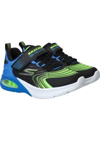 Zwarte en blauwe sport schoenen met groene accenten, met een bovenwerk van mesh, een textuurdesign en een transparante luchtkussenzool. Inclusief klittenbandsluitingen.