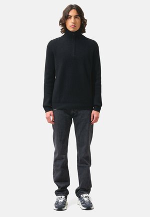 Stickad tröja - black
