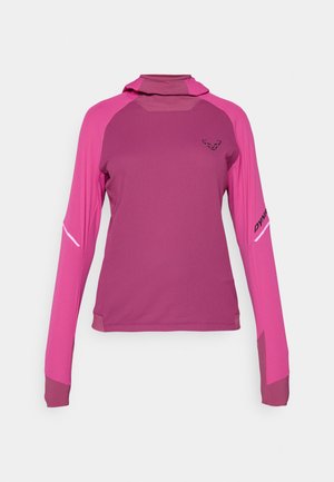 Roosa pikkade varrukatega sportlik särk, millel on sobiv disain, hübriidvärvide blokkeerimine, kõrge kaelus ja rinnaesisesse kantud logo.