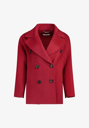 Cappotto di lana rosso doppiopetto con bottoni neri, ampi revers e tasche laterali, esposto su uno sfondo bianco.