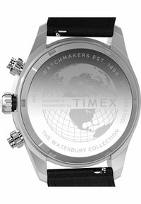 Stainless steel watch case with a black textured leather strap. Features three crowns and a globe detail on the back, inscribed with brand name.