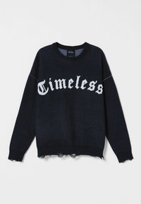 Sudadera negra de cuello redondo con el texto blanco "Timeless", con dobladillos desgastados en los puños y la parte inferior, exhibida sobre un fondo plano.