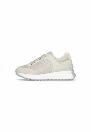 Sneaker beige con una combinazione di materiali in suede e rete, punta rotonda, suola ammortizzata e un logo laterale. Design leggero.