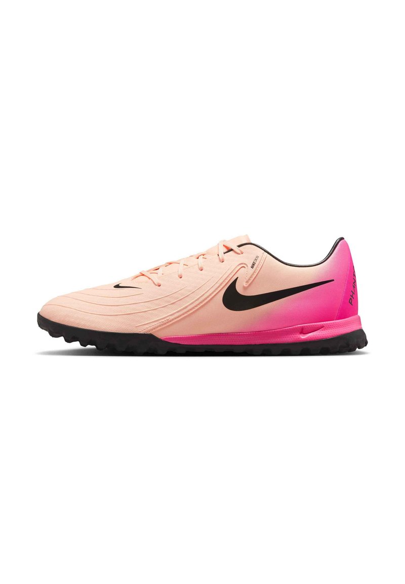 Light pink sports shoes with a black swoosh, textured surface, and a gradient from pink to black on the heel. Treaded black outsole.