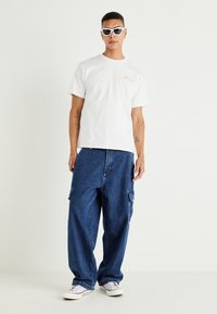 Levi's® VINTAGE FIT GRAPHIC - Nyomott mintás póló - white
