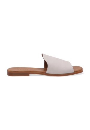 Beige slide sandal with a wide strap and open toe design. Smooth texture with a flat, light brown sole. Subtle branding on the insole.