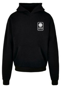Mustat hupparit, joissa on etutasku, ribbaatut hihansuut ja helma. Valkoinen "LOST YOUTH" -logo kukkakuviolla rinnassa. Pehmeä kangas.