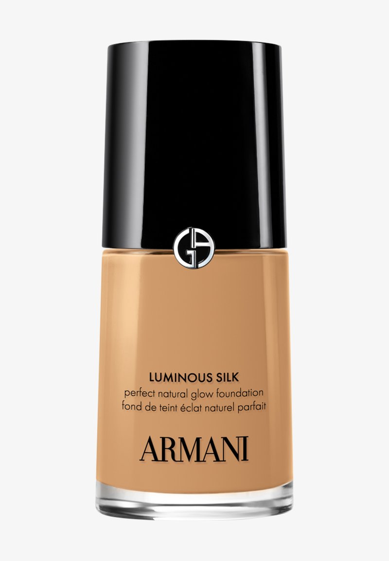 Flasche Armani Luminous Silk Foundation mit schwarzem Deckel und beiger flüssiger Foundation innen.