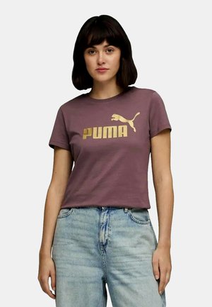 Das kastanienbraune Baumwoll-T-Shirt zeigt auf der Vorderseite ein goldenes PUMA-Logo und ein Design mit einer springenden Katze. Kurze Ärmel und eine normale Passform.