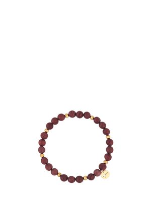 Bracelet with dark wooden beads alternating with small gold beads and a gold charm featuring a cross cutout.