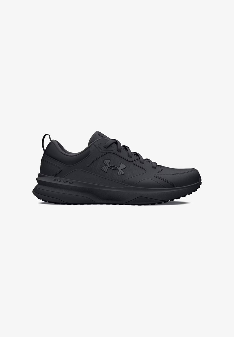 Chaussure de sport Under Armour noire avec lacets, semelle amortissante et logo sur le côté, conçue pour la course ou l'entraînement.