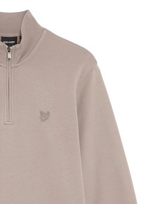 Beige sweatshirt met een kwart rits, voorzien van een hoge kraag en geborduurd logo op de linkerkant van de borst. Zachte, gladde stoftextuur.
