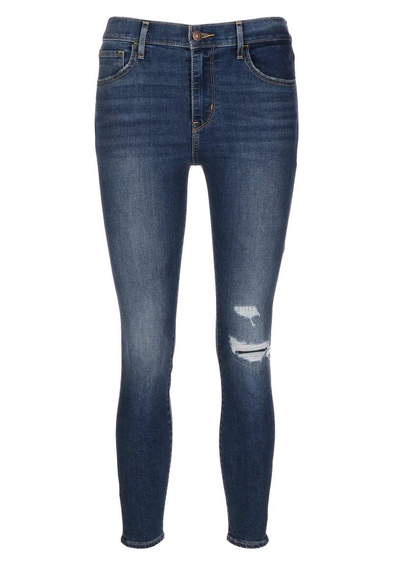 Slim-fit jeans i mörk denim med midjehöjd, rivna detaljer vid knäna och klassisk femfickdesign.