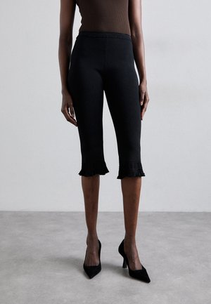 sandro PANTALON CROP MAILLE BAS FANTAISIE - Hlače - noir