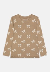 Long-sleeve brown top made of soft fabric, featuring a repetitive pattern of white bows, round neckline, and simple hem.