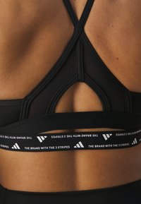 adidas Performance BRA - Sportski grudnjak s blagom potporom - black