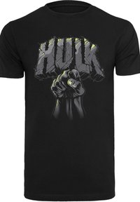 Tricou din bumbac negru, cu un graphic al unei pumn ridicat și cuvântul "HULK" în bold, gri texturat cu accente verzi.
