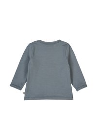 Long-sleeve, rounded neck top in soft gray cotton. Features a simple design with straight seams and small side tag detail.