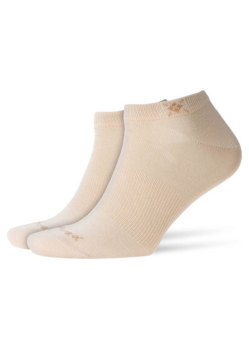 Beżowe skarpetki do kostek wykonane z miękkiego, teksturowanego materiału. Posiadają prążkowany wzór oraz logo w pobliżu ściągacza. Krótka długość powyżej kostki.