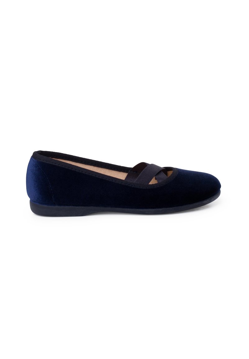 Bailarinas de terciopelo azul marino con punta redonda, tira elástica delgada y suela de goma plana. Textura suave con un diseño simple y minimalista.
