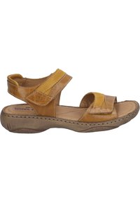 Brown leather sandal with adjustable straps, textured accents, and a cushioned sole. Features a regular shape with a slight heel.