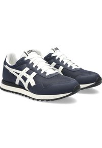 Navy blue athletic shoes with white accents, mesh and synthetic upper, flat laces, rubber sole, and classic running silhouette.