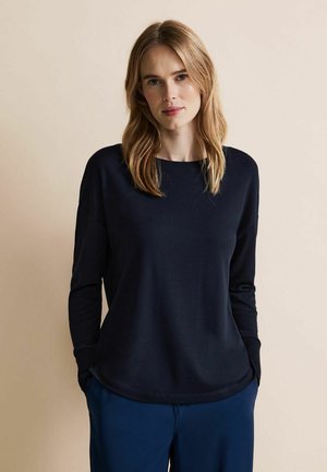 Navy blue long-sleeve shirt with a rounded neckline and ribbed cuffs, made of soft fabric; smooth texture, relaxed fit, and casual design.