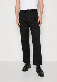 Calvin Klein Trousers - black