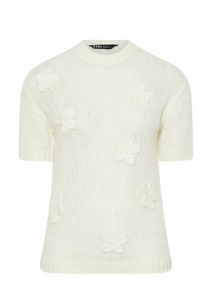 Valkoinen lyhythihainen neulepusero, jossa koholla olevat kukkakuvioinnit sekä resorinen pyöreä pääntie ja helma.