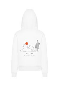 White hoodie featuring a graphic design of mountains, a sunset in orange, and a cactus. Text reads “ESCAPE, AND DISCOVER THE WORLD.”