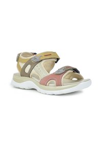 Sandalias multicolores con un diseño en beige, amarillo y rosa, con correas de Velcro, recortes para transpirabilidad y una suela blanca y acolchada.