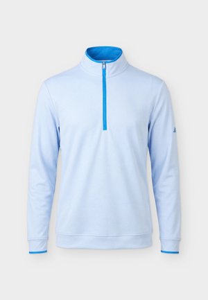 Világoskék hosszú ujjú pulóver negyed cipzárral az elején és álló nyakkal, kék cipzárral és a bal ujjon logóval.