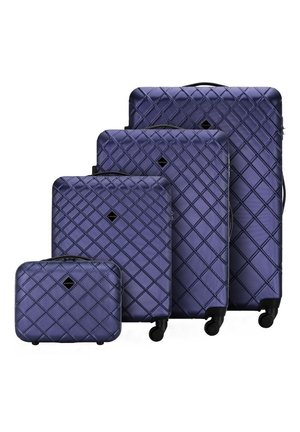 Four purple hard-shell suitcases in various sizes feature a diamond pattern, textured surface, and black wheels, with a logo on each.
