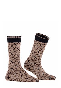 Kniestrümpfe mit einem beigen Grund und einem schwarzen Blumenmuster sowie einem kontrastierenden schwarzen elastischen Bund oben. Weiches, dehnbares Material.