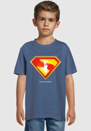 Blue cotton t-shirt featuring a yellow and red superhero emblem with the text "TAKE ME HOME" beneath the design. Short sleeves, relaxed fit.