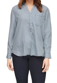 Camicia a righe blu e bianche con bottoni, maniche lunghe, tasca sul lato sinistro e orlo arrotondato, realizzata in tessuto leggero.