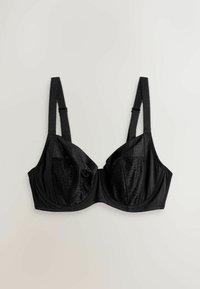 Soutien-gorge noir combinant un tissu lisse et texturé, avec des bonnets à armatures, des bretelles réglables et une fermeture classique à agrafes dans le dos.