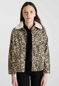 Leoprinten jas met een nepbontkraag, met twee voorkantenzakken en een licht oversized pasvorm. Gemaakt van een zachte, gestructureerde stof.