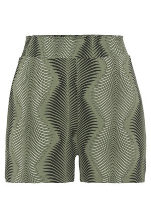 Grüne Shorts mit einem elastischen Bund, die ein geometrisches schwarzes Blattmuster zeigen. Hergestellt aus weichem Stoff, haben sie eine lockere Passform.