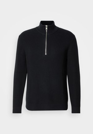 Pull noir en tricot côtelé avec un col haut et une courte fermeture éclair. Il dispose de manches longues et d'un ourlet droit avec des poignets côtelés.