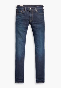 Mörkblå denimjeans med slim fit, med fem fickor, koppardetaljer och subtila blekningar på låren och knäna.