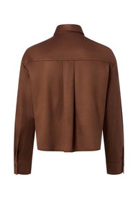 Brown long-sleeve shirt with a back yoke and a center pleat, featuring buttoned cuffs and a classic collar.