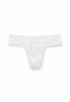 String en dentelle blanche avec un motif floral, des bords festonnés et une texture douce. La taille est large et confortable.